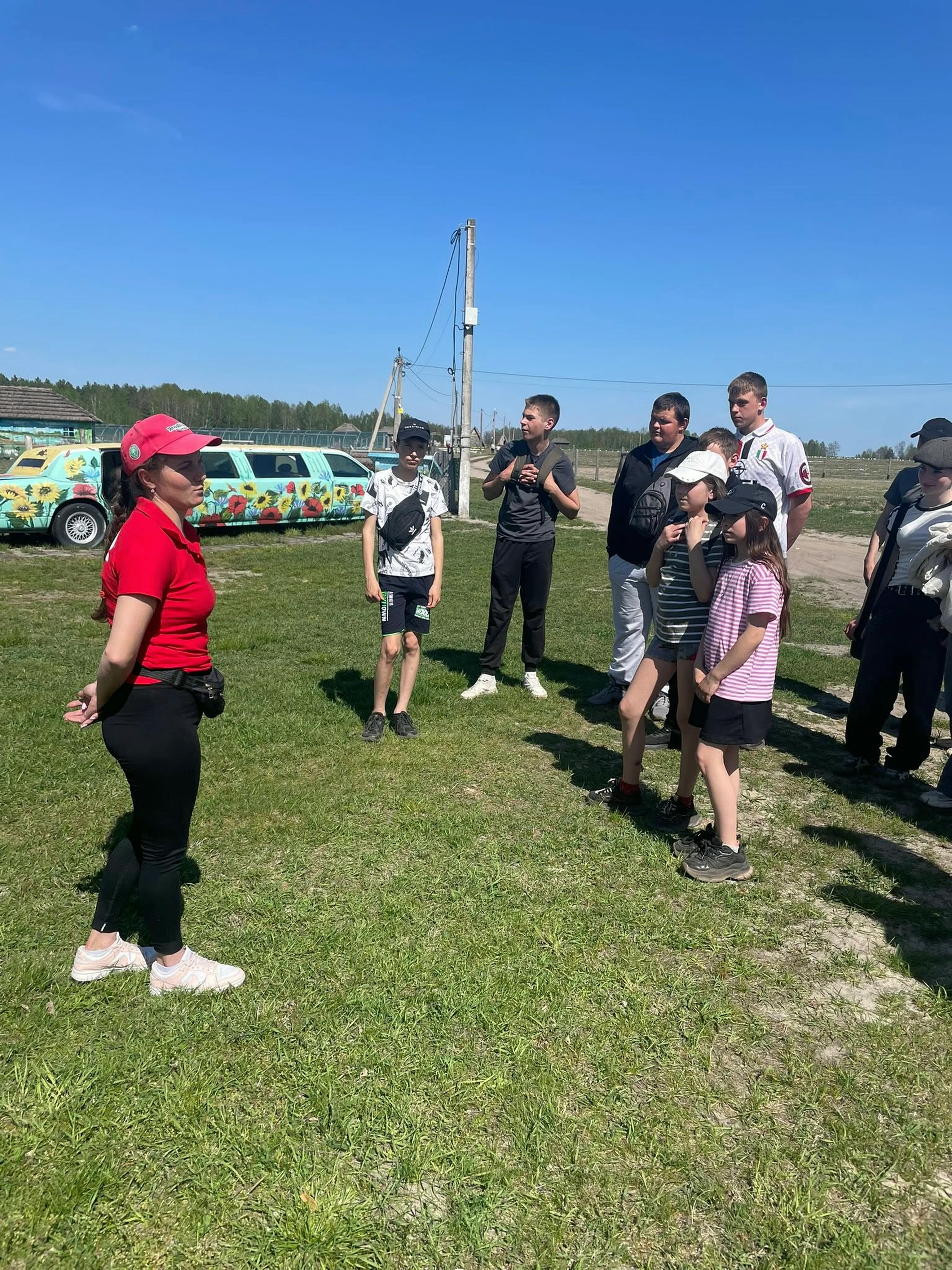 A team member introducing the farm to pupils